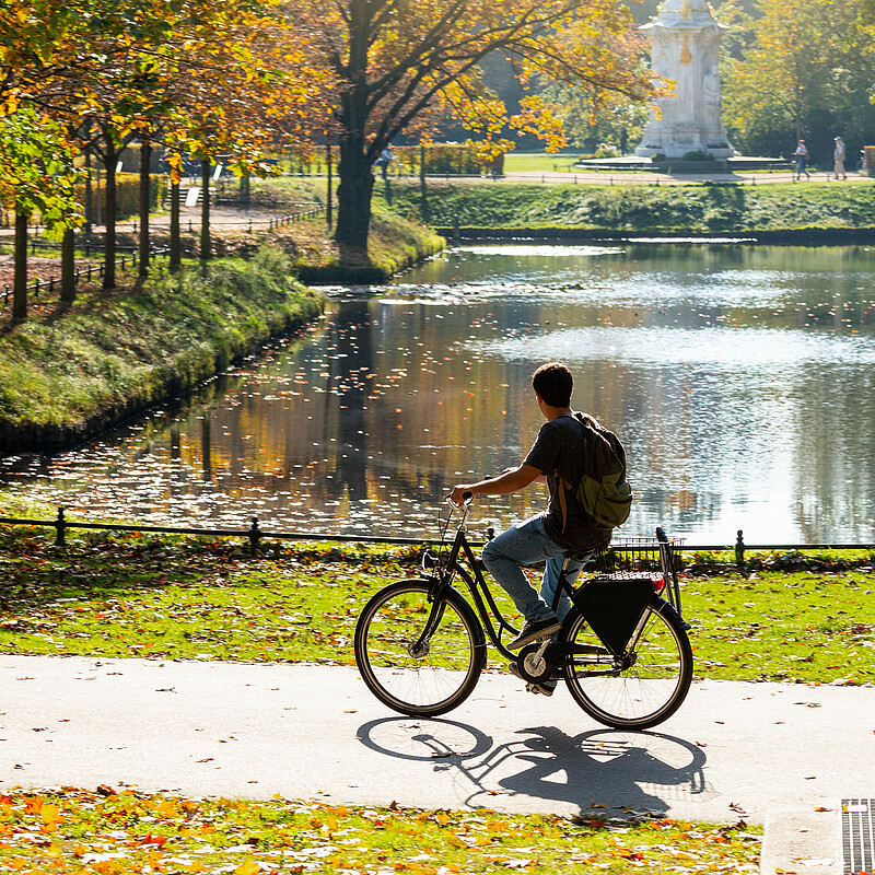 Good for the soul and the environment – riding a bike in Berlin Riding a pushbike in a Berlin park