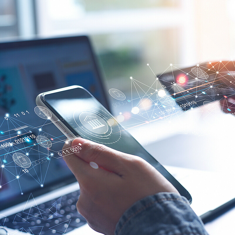 Berlin FinTech and SME synergy Smartphone with finance app, symbolizing Berlin’s FinTech SME solutions