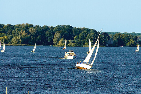 Sailing on the Wannsee. Pleasure boats and sailboats on the Wannsee, in the Berlin borough of Steglitz-Zehlendorf.