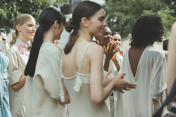 Backstage elegance at the Berlin Fashion Week Waiting to taxi – models ready for the runway at Berlin Fashion Week